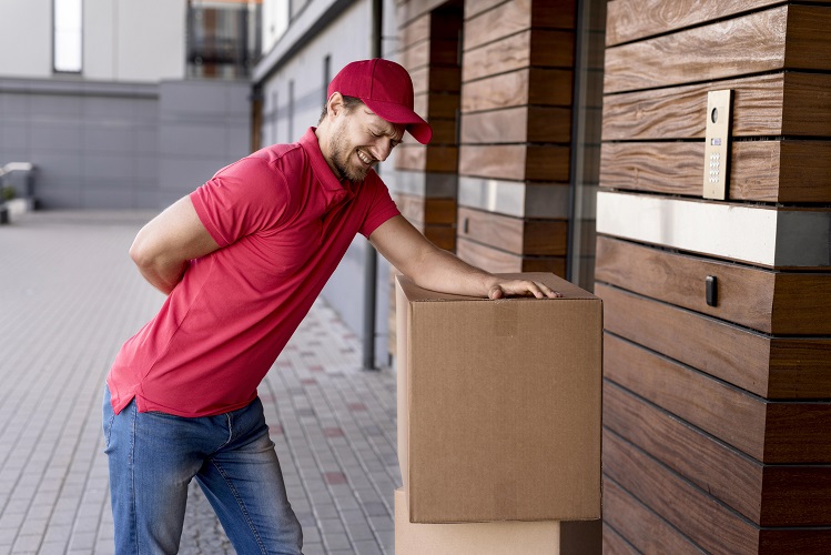 delivery-man-having-back-pain-from-carrying